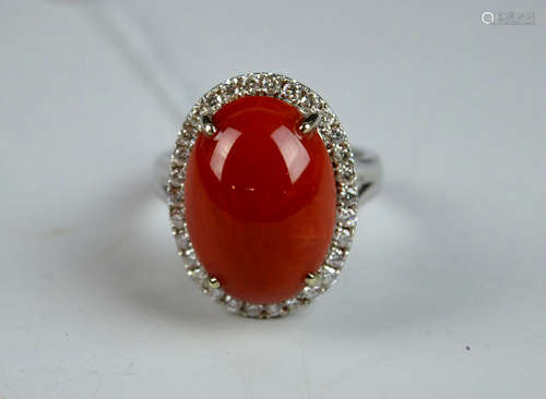 Dark Coral Cabochon set in 18K White Gold