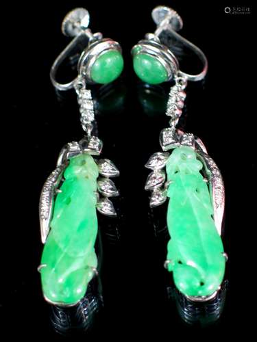 Pair of 14K White Gold Carved Green Jadeite Earrings.