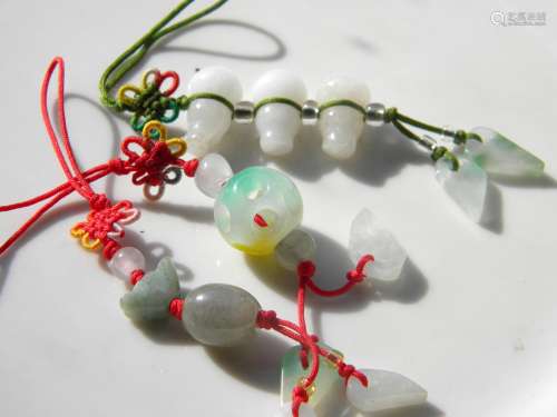 Three Chinese Jade Chain Pendants