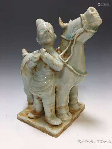 A Chinese Glazed Porcelain Figure