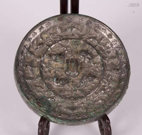 CHINESE CIRCULAR BRONZE MIRROR, BEAST & GRAPEVINE