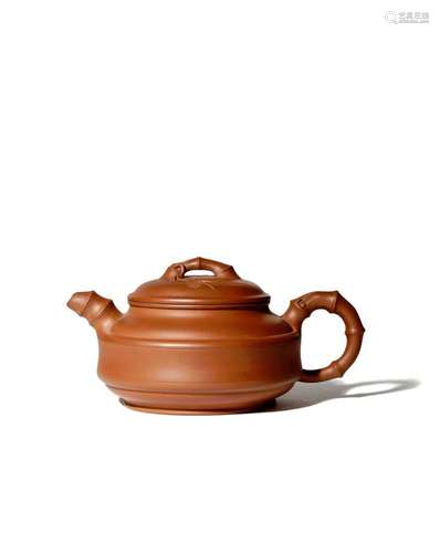 A CHINESE YIXING TEAPOT AND COVER