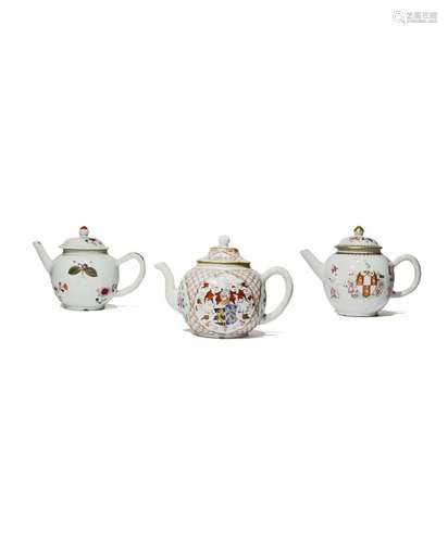 TWO CHINESE ARMORIAL FAMILLE ROSE TEAPOTS AND COVERS