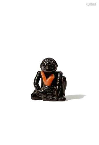 A JAPANESE WOOD NETSUKE