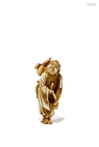 A TALL JAPANESE IVORY NETSUKE