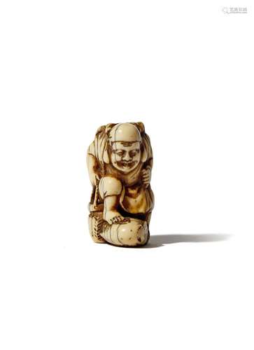 A JAPANESE IVORY NETSUKE