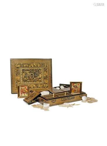 A CHINESE BLACK AND GOLD LACQUER RECTANGULAR GAMES BOX