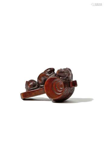 A JAPANESE WOOD NETSUKE