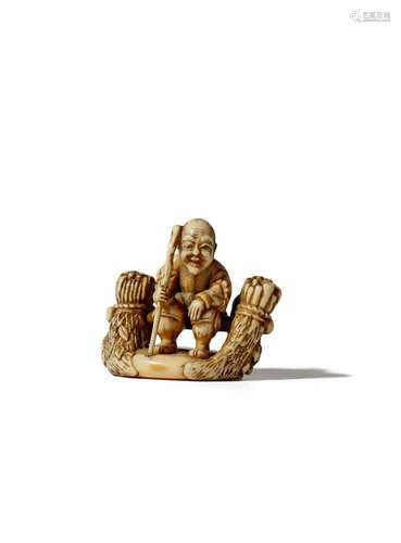 A JAPANESE IVORY NETSUKE