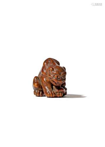 A JAPANESE WOOD NETSUKE