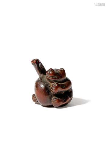 A JAPANESE WOOD NETSUKE