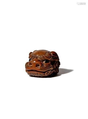 A JAPANESE WOOD NETSUKE