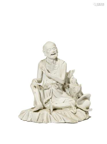 A CHINESE BISCUIT PORCELAIN MODEL OF AN ASCETIC MAN