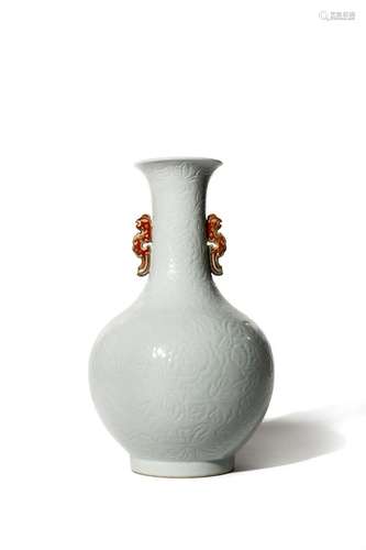 A CHINESE WHITE GLAZED BOTTLE VASE