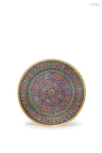 A PERSIAN GILT METAL AND ENAMEL PLATE