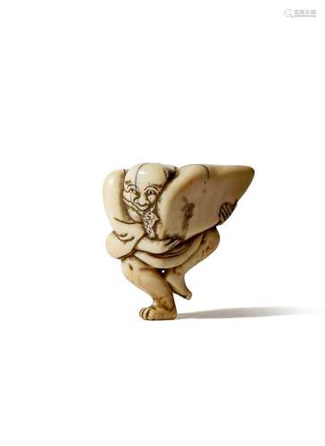 A JAPANESE IVORY NETSUKE