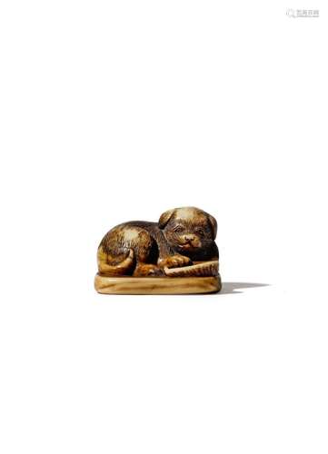 A JAPANESE IVORY NETSUKE