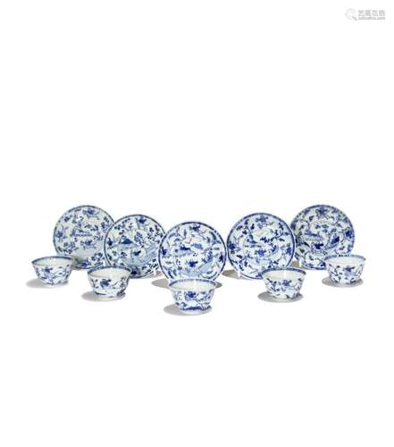 A SET OF FIVE CHINESE BLUE AND WHITE MINIATURE TEA BOWLS AND SAUCERS