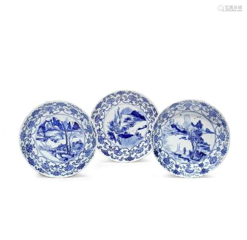 THREE CHINESE BLUE AND WHITE 'MASTER OF THE ROCKS' DISHES