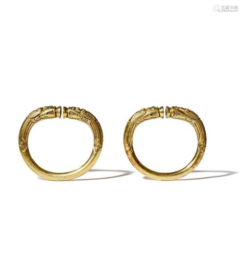 A PAIR OF CHINESE GILT BRONZE BANGLES