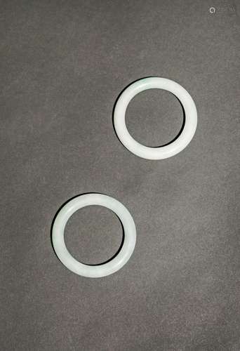 A PAIR OF CHINESE JADEITE BANGLES