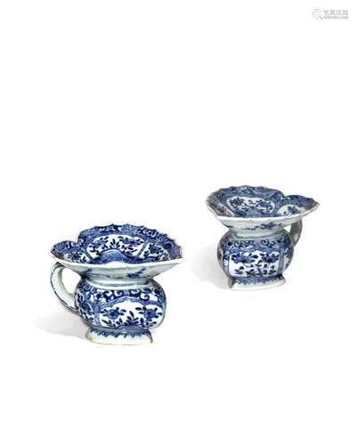 AN UNUSUAL PAIR OF CHINESE BLUE AND WHITE SPITTOONS