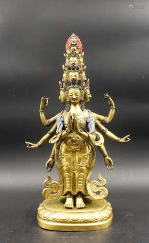 A REPOUSSÉ GILT-BRONZE FIGURE OF AN AVALOKITESVARA