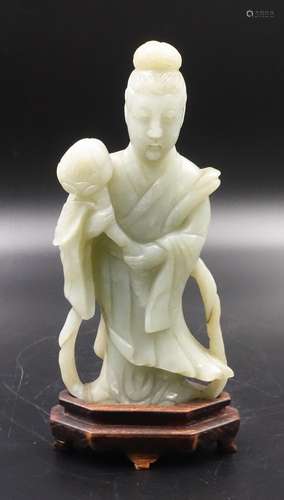 CHINESE CELADON JADE FIGURE OF GUANYIN