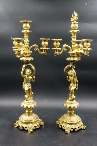 PAIR OF GILT BRONZE CHERUB CANDLE STAND