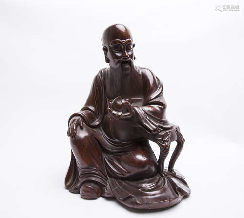 A Chinese Carved Hardwood Seated Lohan