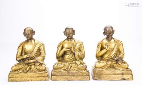 A Set of Three Chinese Gilt Bronze Guru