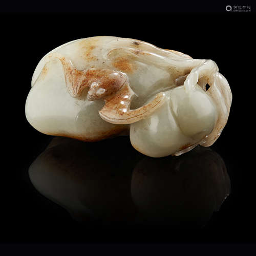 CELADON AND RUSSET JADE CARVED 'PEACH AND BAT' GROUP QING DYNASTY, 17TH/18TH CENTURY