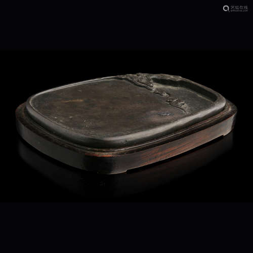DUAN INKSTONE IN BLACKWOOD BOX AND COVER QING DYNASTY, 18TH CENTURY