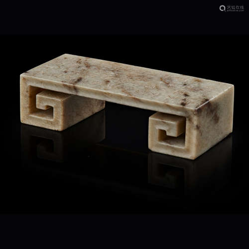 MOTTLED GREY JADE CARVED AND INSCRIBED SCROLL-FORM STAND QING DYNASTY, 19TH CENTURY