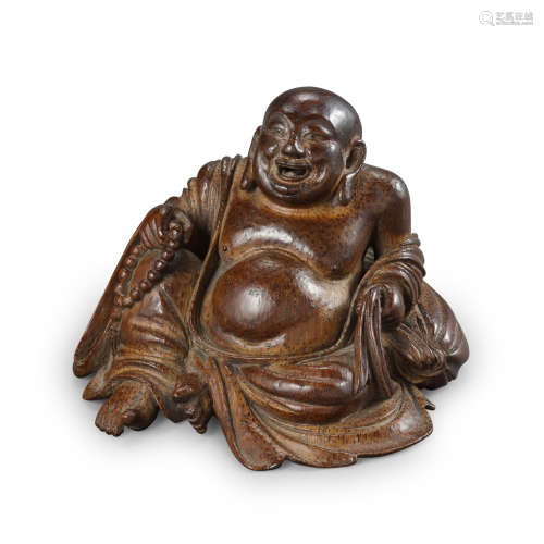 FINE AND RARE CARVED BAMBOO FIGURE OF LAUGHING BUDAI QING DYNASTY, 18TH CENTURY
