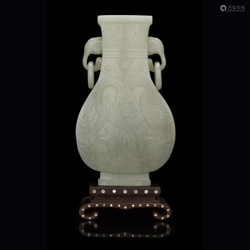 CARVED CELADON JADE 'HU' VASE KANGXI PERIOD