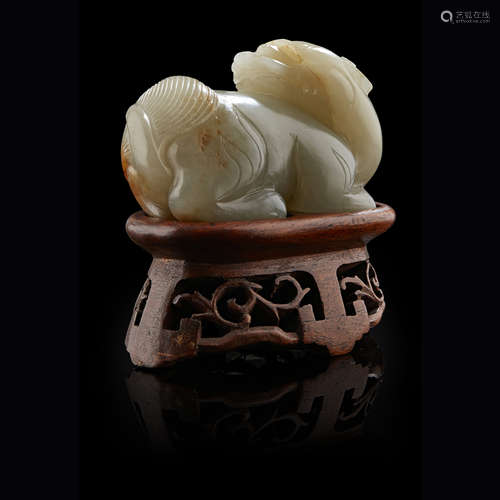 CELADON AND RUSSET JADE CARVING OF A BIXIE MING DYNASTY