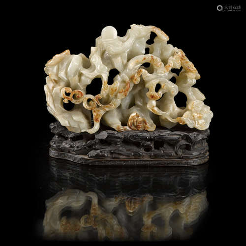 RETICULATED CELADON JADE 'WUFU' BOULDER QING DYNASTY, 18TH CENTURY