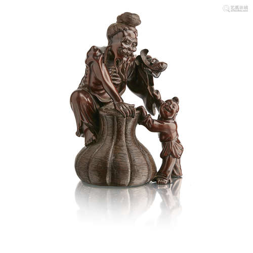 FINE BOXWOOD CARVED FIGURAL GROUP OF A FISHERMAN AND A BOY MID-QING DYNASTY