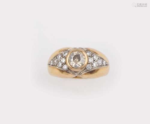 A gold and diamond ring