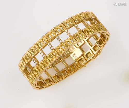 A diamond and gold bracelet
