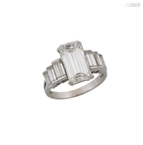 An unmonted emerald - cut diamond ring. R.A.G report