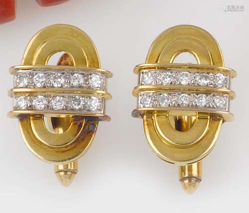 A pair of diamond and gold cufflinks
