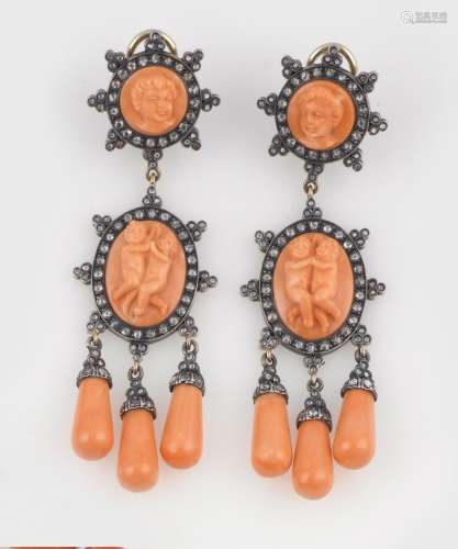 A pair of coral, diamond, gold and silver pendent earrings. Puttini Capri