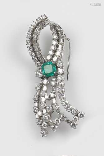 An emerald and diamond brooch