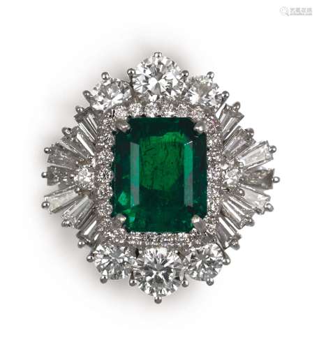 An emerald and diamond ring. Gubelin report