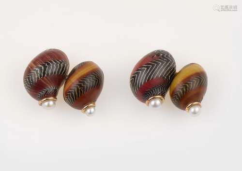 A pair of enamel and pearl cufflinks
