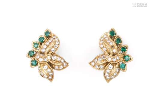 A pair of diamond and emerald earrings