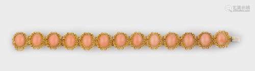 A coral and gold bracelet
