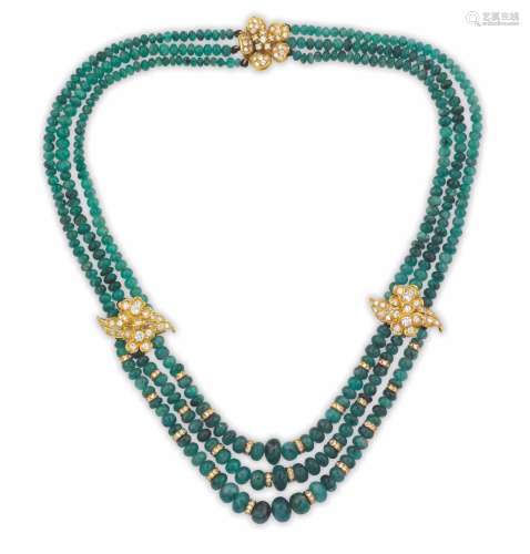 An emerald, gold and diamond necklace